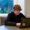 Dominic Levy does homework at his home in Clayton on Jan. 29, 2023. Photo by Shelby Knowles for CalMatters