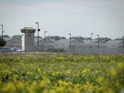 A guard tower at the California Health Care Facility prison in Stockton on March 2, 2022. Miguel Gutierrez Jr., CalMatters