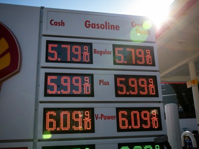 A close up of a digital gasoline sign, with various prices. The words, "CASH," "Gasoline," "Credit/Debit" are visible at the top. "Regular," "Plus," and "V-Power" are visible in the middle. Prices range from $5.79 to $6.09.