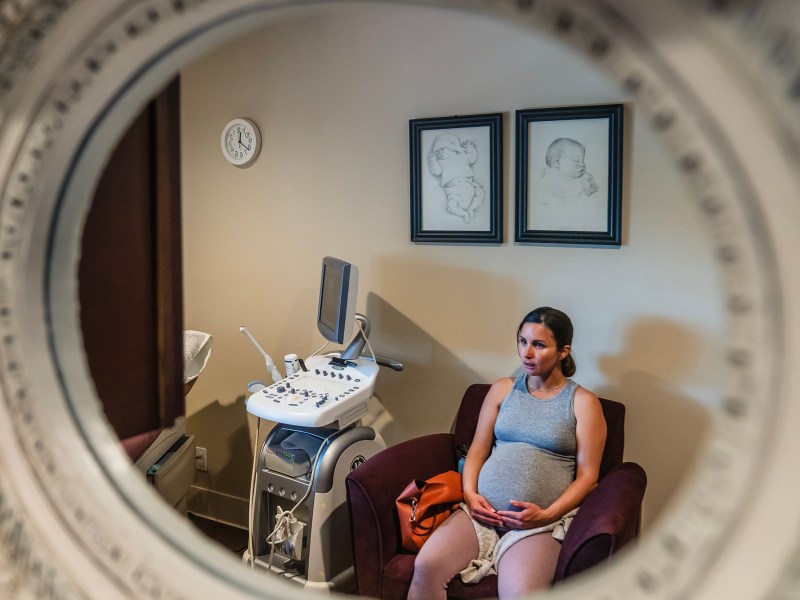 Sally K., thirty-eight weeks pregnant, waits for her check-up at the Best Start Birthing Center in San Diego on March 20, 2024. Photo by Ariana Drehsler for CalMatters