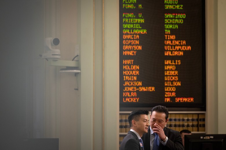 Assemblymember Evan Low speaks with fellow lawmaker Phillip Chen at the Capitol on March 27, 2023. Photo by Miguel Gutierrez Jr., CalMatters