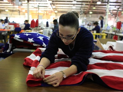 An inmate works on an American flag while working in the Prison Industries Authority Fabrics program at the Central California Women's Facility in Chowchilla on April 5, 2012. Photo by Lea Suzuki, San Francisco Chronicle via AP