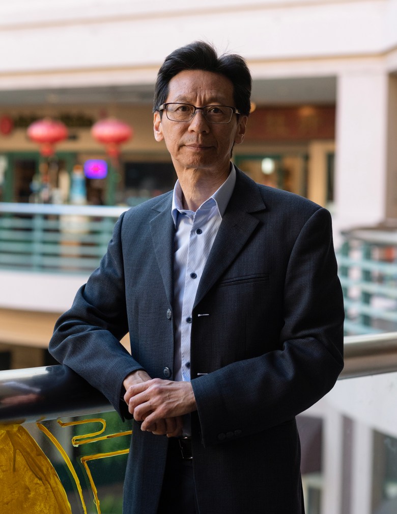 Carl Chan, president of Oakland's Chinatown Chamber of Commerce, near his office in Oakland on April 11, 2024. Photo by Laure Andrillon for CalMatters