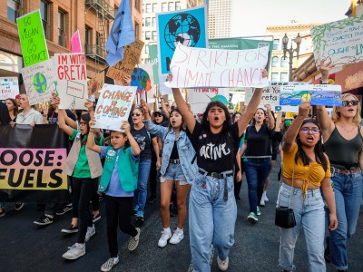 Climate activists participate in a student-led climate change march in Los Angeles in 2019. Photo by Ringo H.W. Chiu, AP Photo