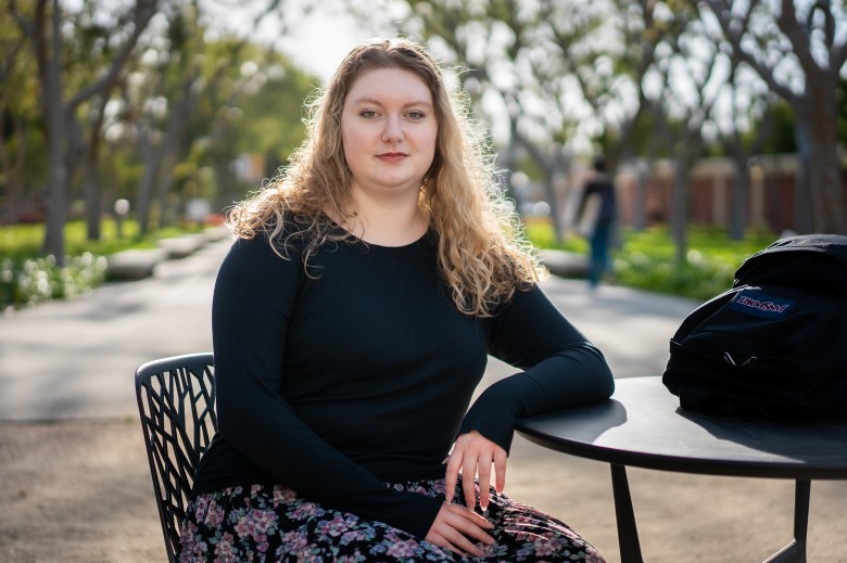 Lauren Niebel, a student majoring in creative writing, at CSU Long Beach on April 24, 2024. Photo by Jules Hotz for CalMatters