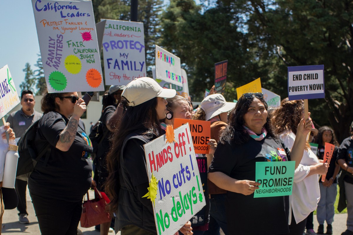 People rallied at the Capitol in Sacramento in protest of proposed budget cuts on May 15, 2024. Photo by Renee Lopez for CalMatters