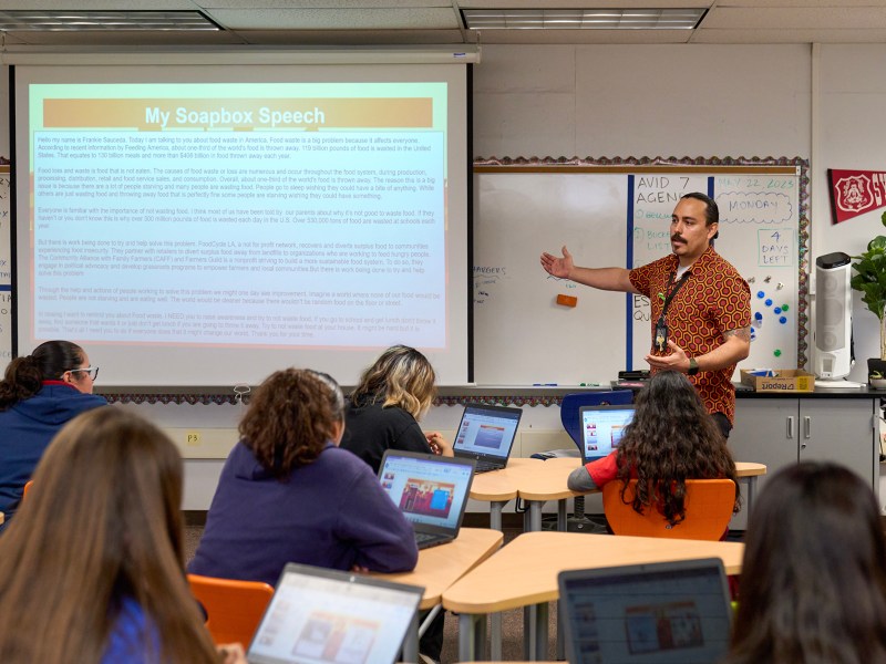 Nicholas Cordova, 7th grade history teacher, teaches his class at Sycamore Junior High School in Anaheim on May 22, 2023. Photo by Lauren Justice for CalMatters