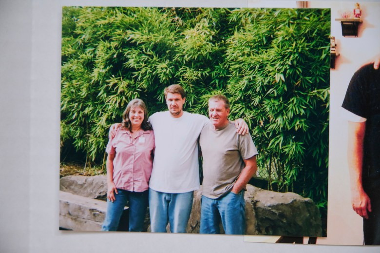 A photo of Adam Joseph Collier with his parents at Oregon State Hospital in 2007. Photo courtesy of Susan Otteles