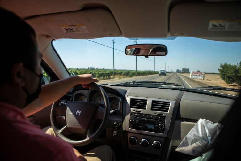 STD Investigator Hou Vang drives to a rural town in Fresno County to make a home visit with a pregnant patient and provide them with information on July 14, 2022. Vang says many of his patients struggle to get to the nearest hospital that can provide treatment for syphilis. Photo by Larry Valenzuela, CalMatters/CatchLight Local