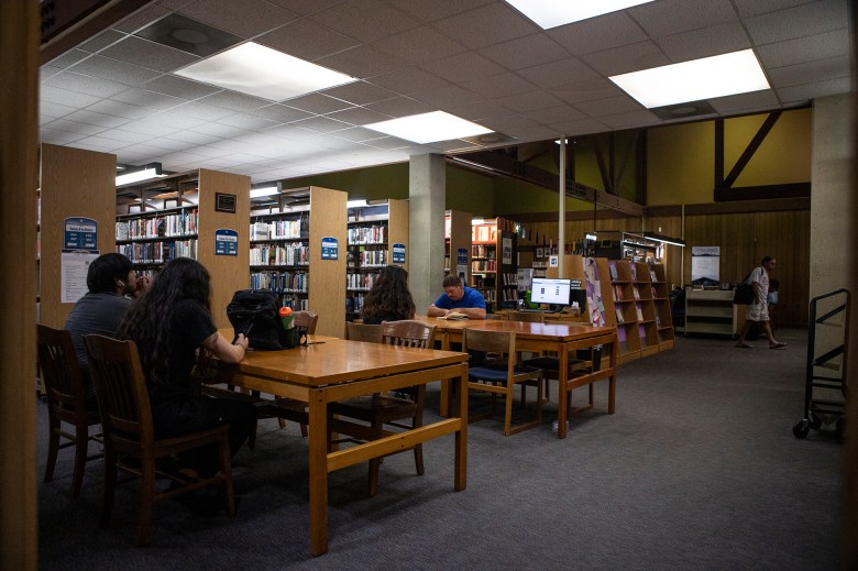 Book shelves lined up in the Fresno County Library Clovis Branch on July 31, 2024. Photo by Larry Valenzuela, CalMatters/CatchLight Local