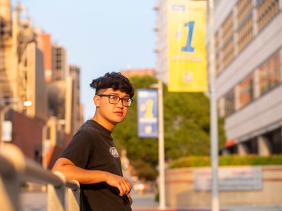 Alex Valdivia, a junior studying political science at UCLA, stands for a portrait on August 24, 2021. He became interested in politics during the pandemic and is now policy director at Project Superbloom, a PAC focused on training young people to run for the state Legislature in 2022. Photo by Shae Hammond for CalMatters