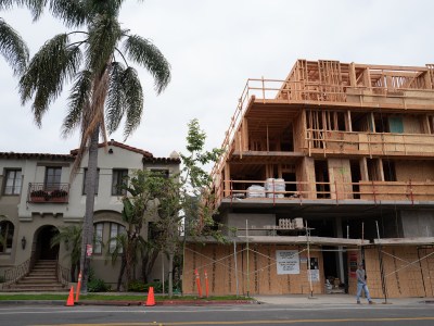 A construction site to a apartment complex.