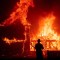 A home burns as the Camp Fire rages through Paradise on Nov. 8, 2018. Photo by Noah Berger, AP Photo