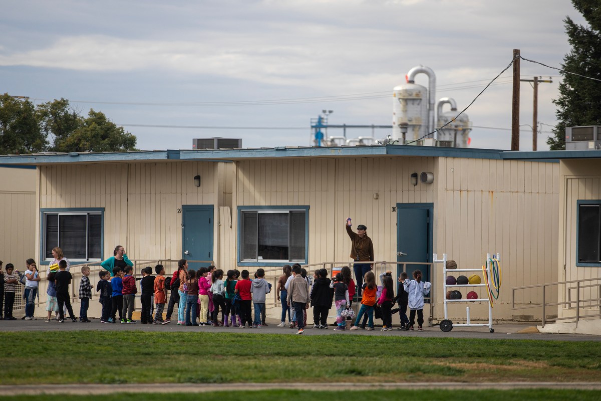 Students line up to enter their classrooms at Keyes Elementary School in Keyes on Nov. 15, 2023. Photo by Larry Valenzuela, CalMatters/CatchLight Local