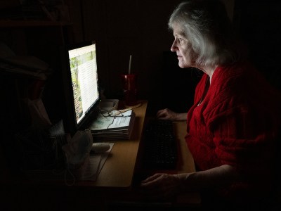 Nance Parry spends hours each day at home gazing in her computer while searching and applying for jobs at her home in Duarte. Dec. 6, 2021. Photo by Raquel Natalicchio for CalMatters