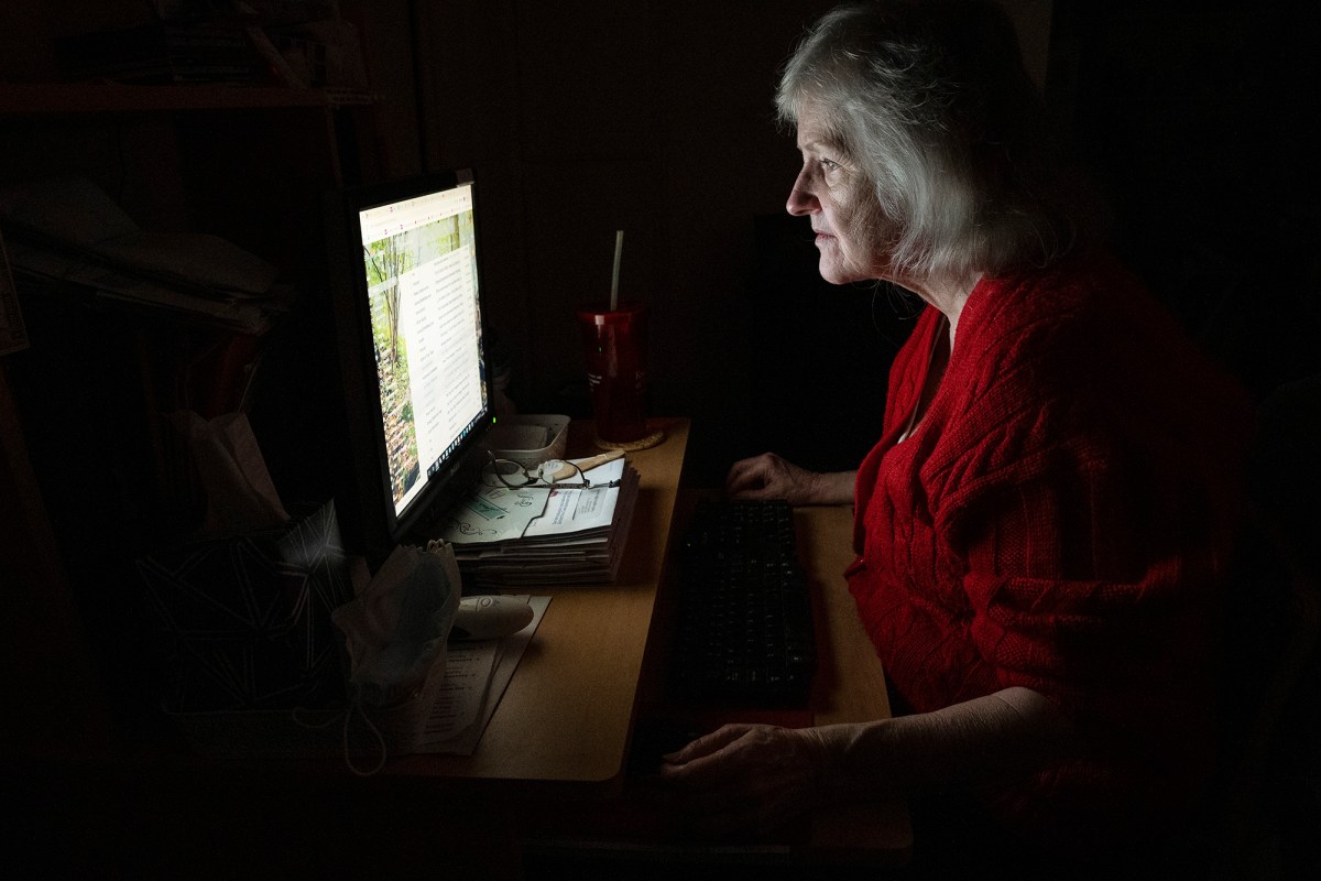 Nance Parry spends hours each day at home gazing in her computer while searching and applying for jobs at her home in Duarte. Dec. 6, 2021. Photo by Raquel Natalicchio for CalMatters