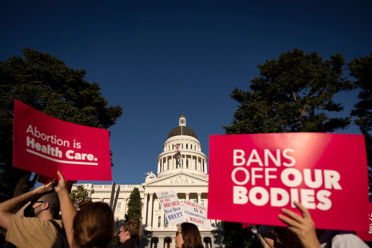 Pro-abortion rights supporters marched in protest of a Supreme Court ruling that overturned Roe vs. Wade, in Sacramento on June 25, 2022. Photo by Miguel Gutierrez Jr., CalMatters